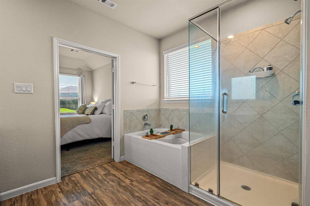 Luxurious primary ensuite with elegant finishes and abundant natural light.