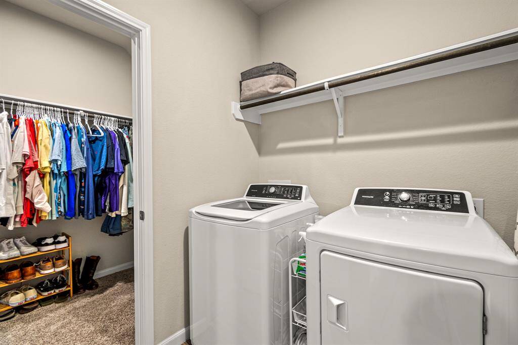 Enjoy the convenience of a primary closet with direct access to the laundry room.