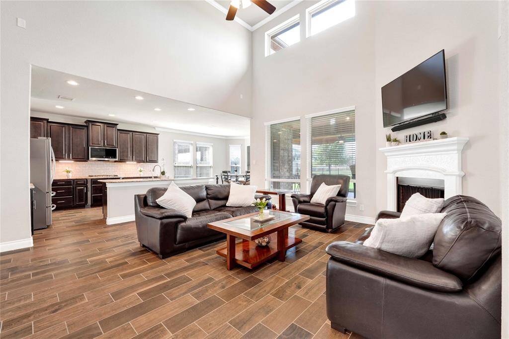 Open concept living space connected to kitchen