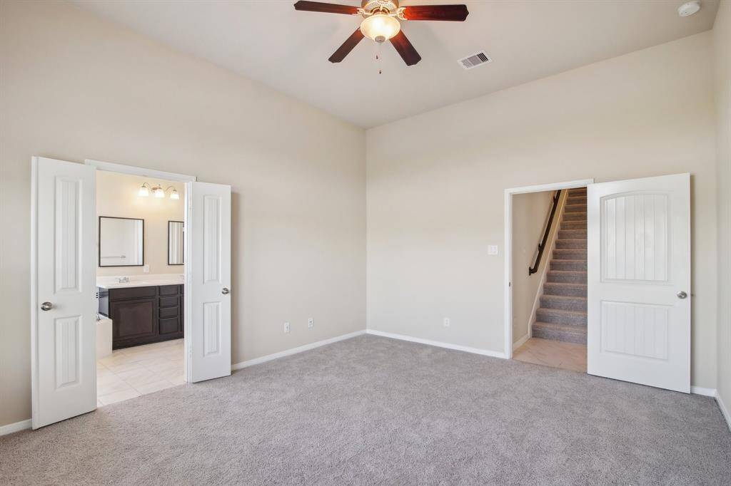Primary bedroom with lake views!