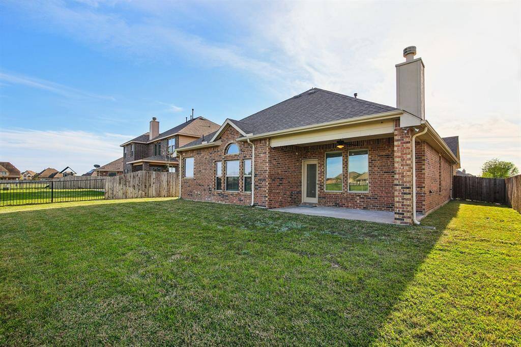 Back yard with view of the lake and walking trails!