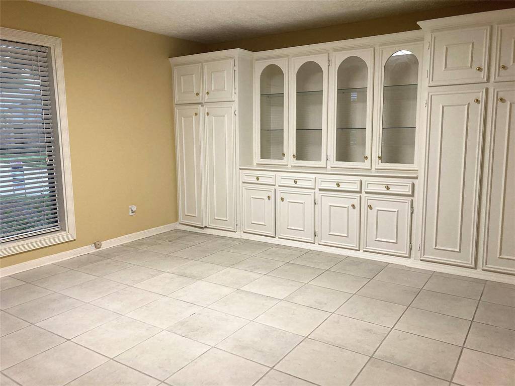 Formal dining room at front of home.