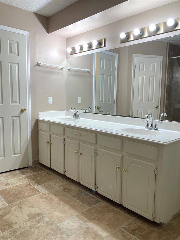 Primary bathroom with double sinks.