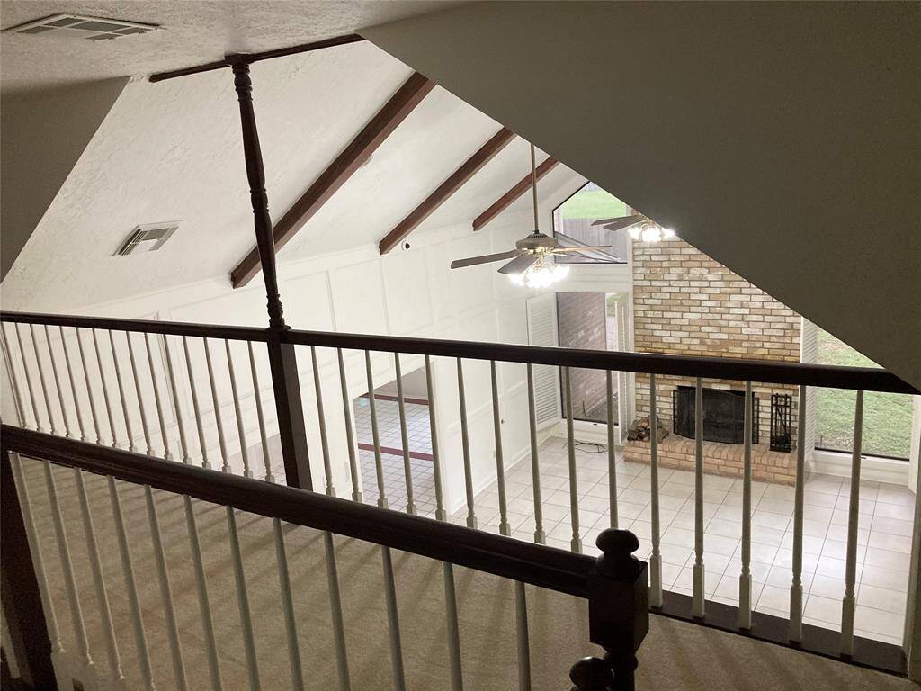Walkway overlooking living room.