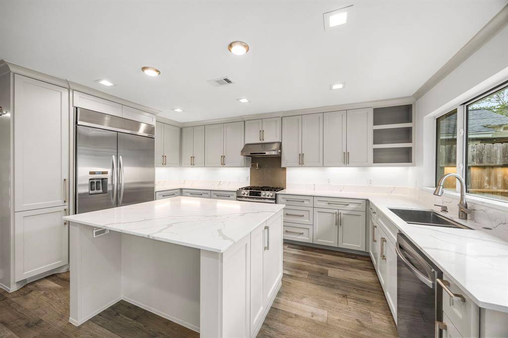 Update large kitchen overlooking the large backyard