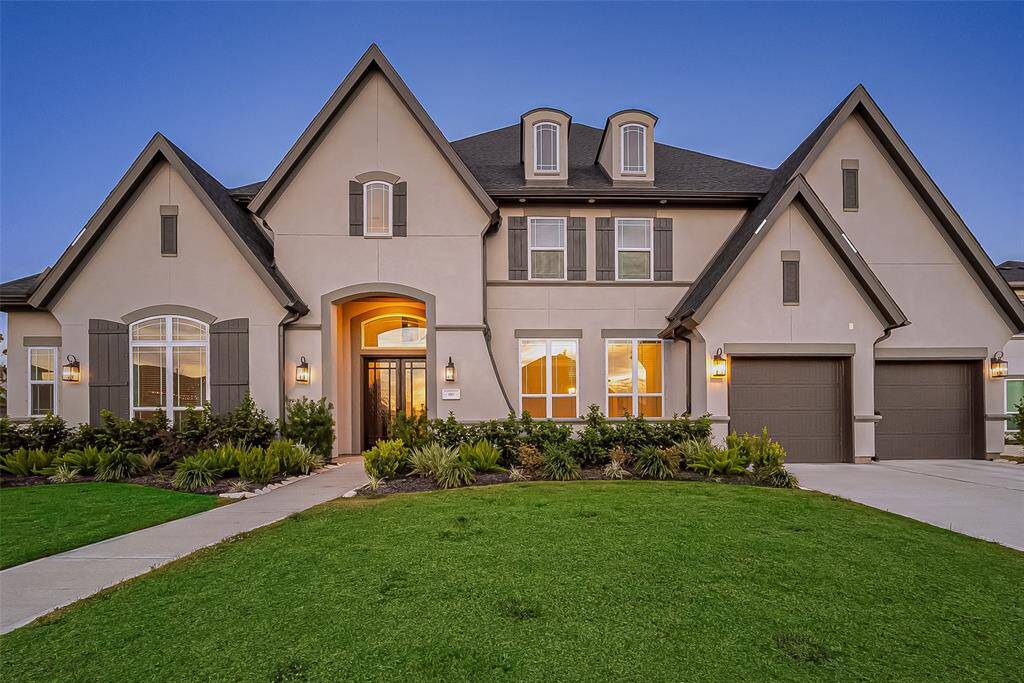 This stunning Toll Brothers "Sandhaven Chateau Plan" is nestled in the prestigious Executive community of Pomona in Manvel, Texas, known for its luxury lifestyle and convenient location. Positioned on a premium corner lot with no direct back neighbors, this home provides privacy and ample outdoor space. Its central location offers easy access to the Medical Center and downtown Houston, making it a highly sought-after address.
