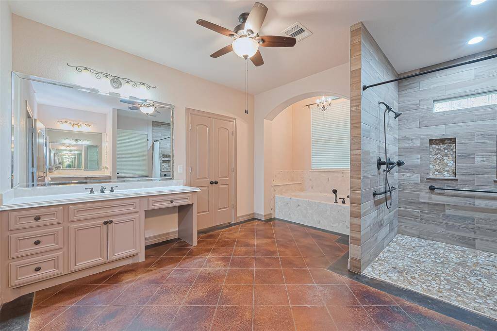 primary bath with dual vanity areas