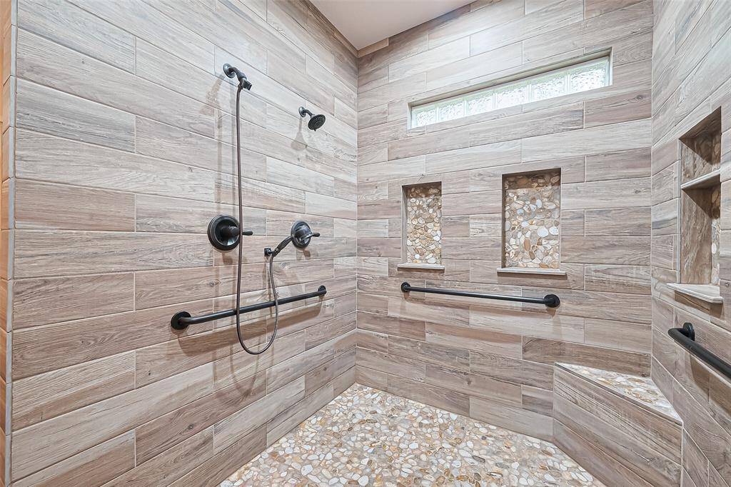 walk-in shower in primary is wheelchair accessible