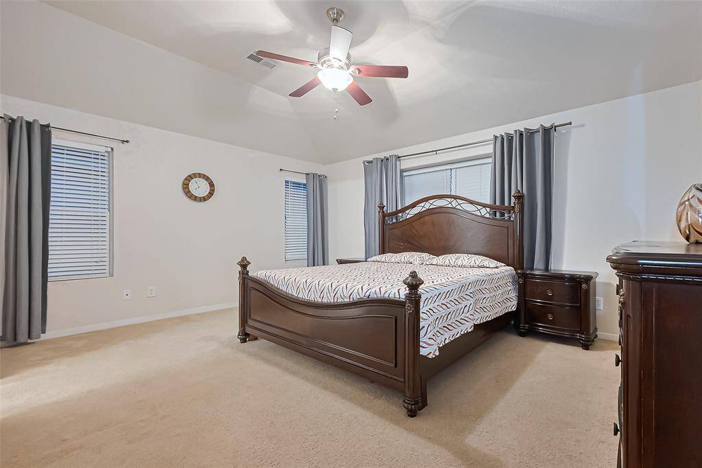 Large primary suite upstairs with his and her closets