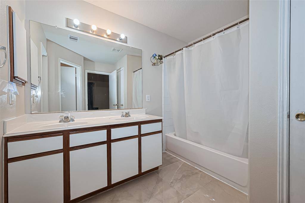 Ensuite with double vanity and tub/shower combo