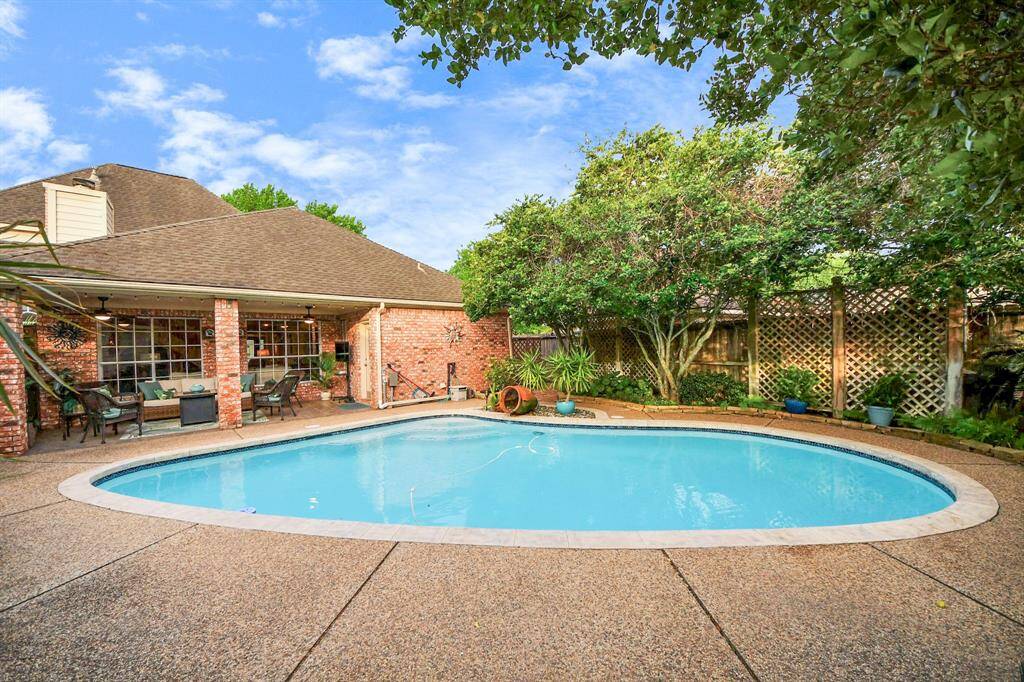 SUMMER READY! Meticulous attention has been given to every detail of this yard, creating a true place where you can vacation in the comfort of your own home.