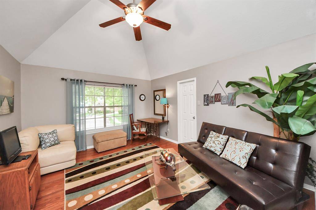 This secondary bedroom is currently being used as a bonus space and sitting area. The generously sized bedrooms offer great versatility, easily adapting to your needs.