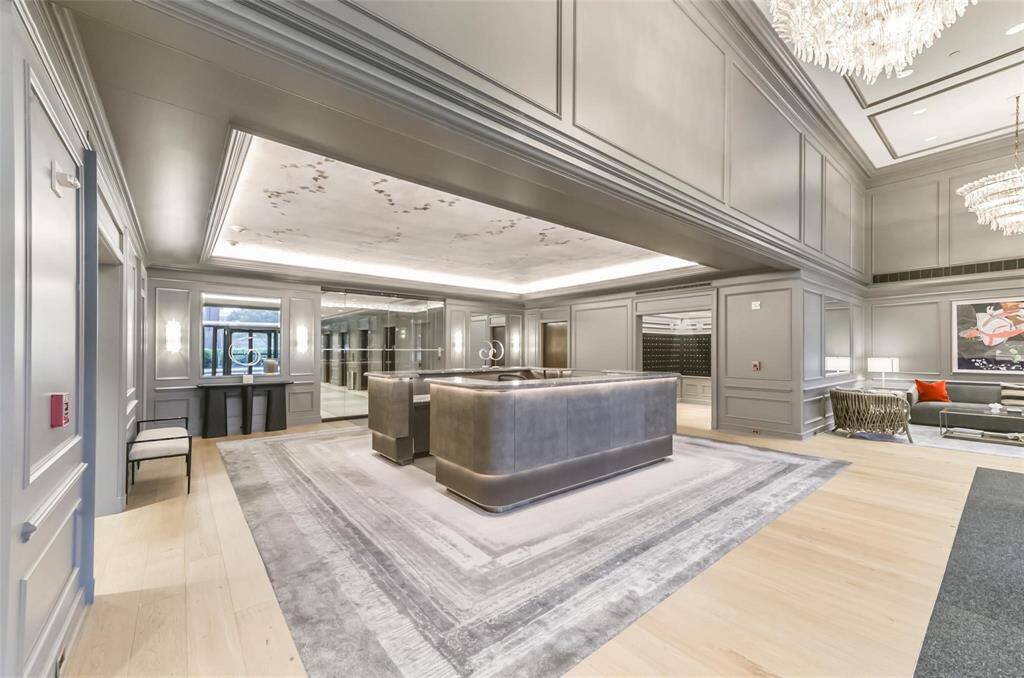 Full lobby view with the concierge desk.