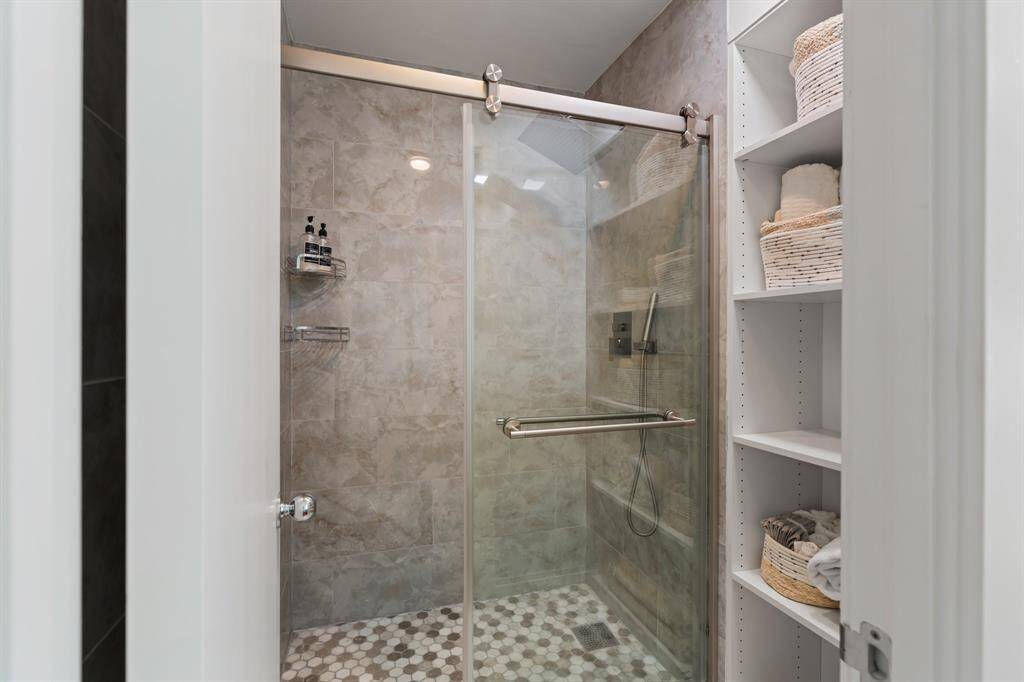 Shower detail at primary suite.