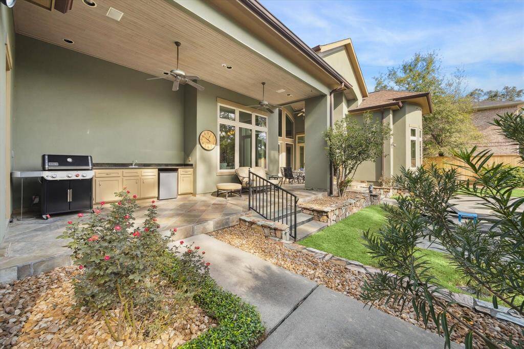 The wide and welcoming Veranda has a Summer Kitchen, three seating areas and a wood burning fireplace for those chilly Summer nights.