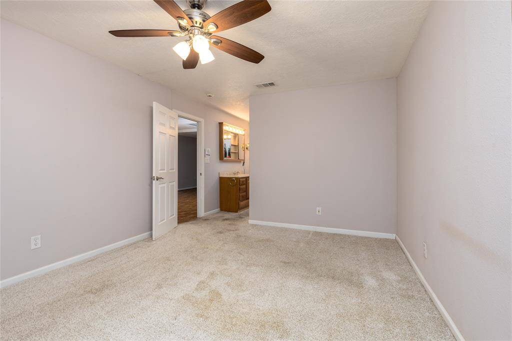 Main Bathroom has double sinks and walk in shower.