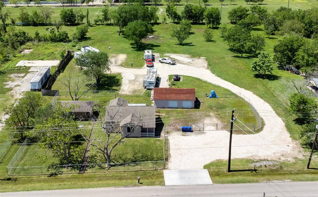 Driveway has recently had new white rock spreader over the driveway for easier driving and parking.