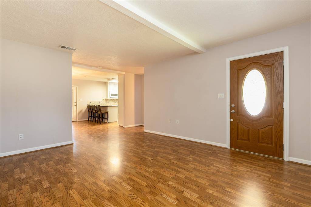 Living room opens up into the Dinning room and Kitchen area.
