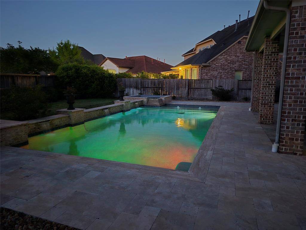 Evening pool... Note-Pool is surrounded by a decent sized yard, with beautiful gardens