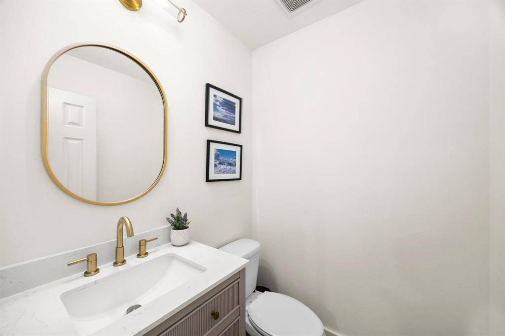 Half bath located downstairs for guests