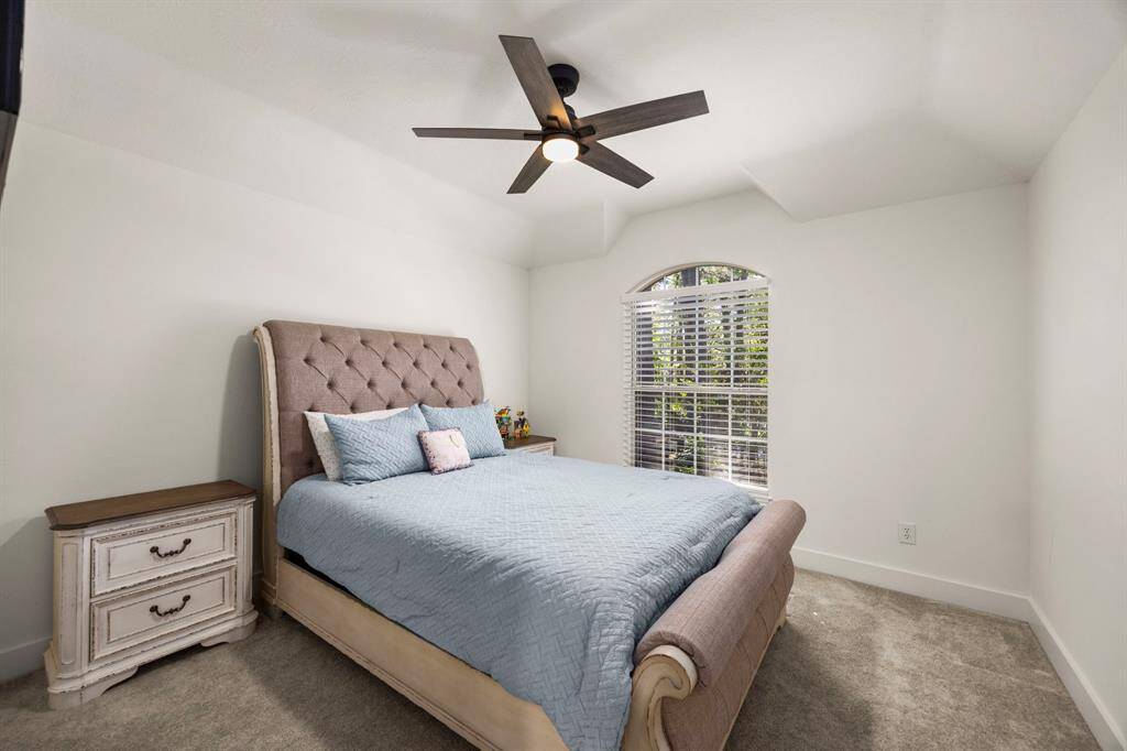 Secondary bedroom overlooking the front yard