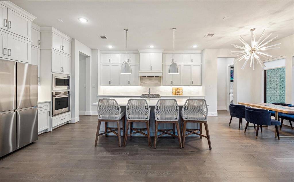 You'll find a sprawling turfed backyard complete with covered porch and putting green.