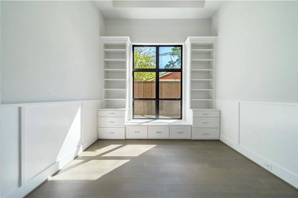 A must-have office with built ins and double glass doors. (Currently used as nursery.)