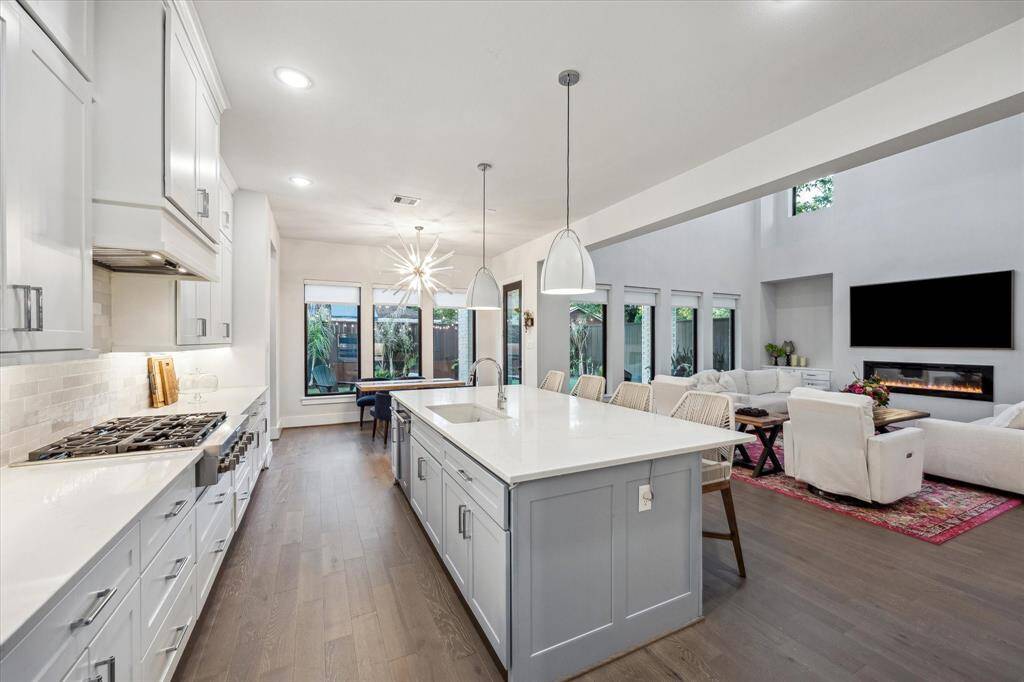 Alternate view. Kitchen overlooks backyard and living space.