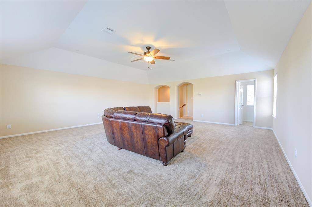 This enormous room also has beautiful tall ceilings.