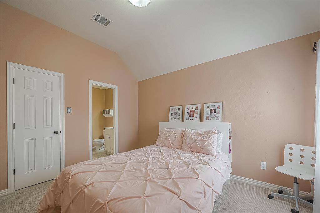 Upstairs bedroom with private full bathroom