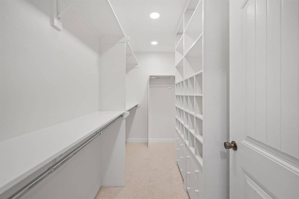 Spacious walk-in closet in the primary bathroom.