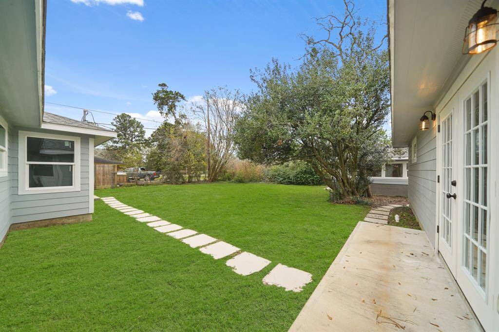 This HUGE backyard is definitely not lacking on green space.