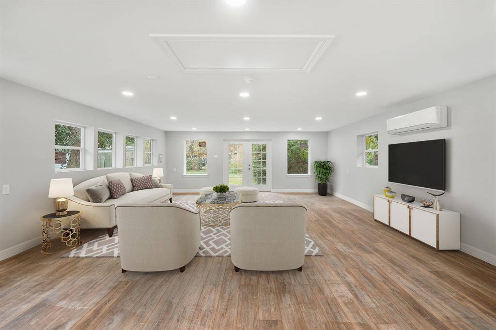 Virtually Staged: You'll be instantly greeted by beautiful engineered wood floors.