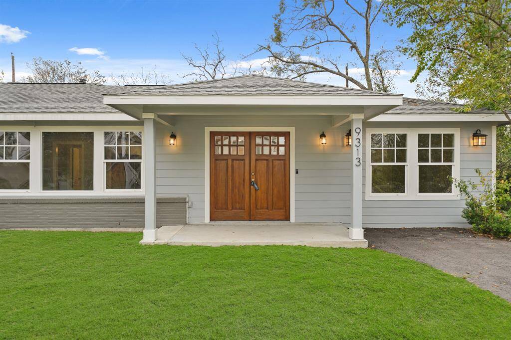 A beautiful array of windows allow natural light through the front of the home.