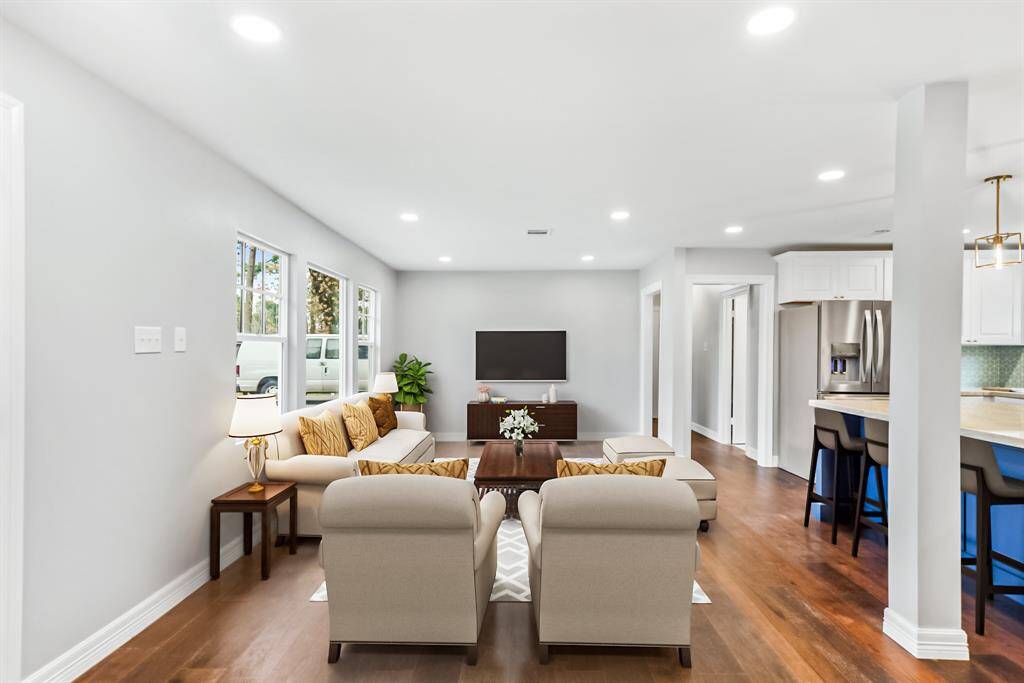 Virtually Staged: This living room is an entertainer's dream! Direct access to the kitchen where you can be cooking for family and friends all while still being in the center of all of the action!
