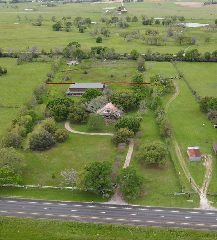 3.93 acres starts at red line, back of total property.