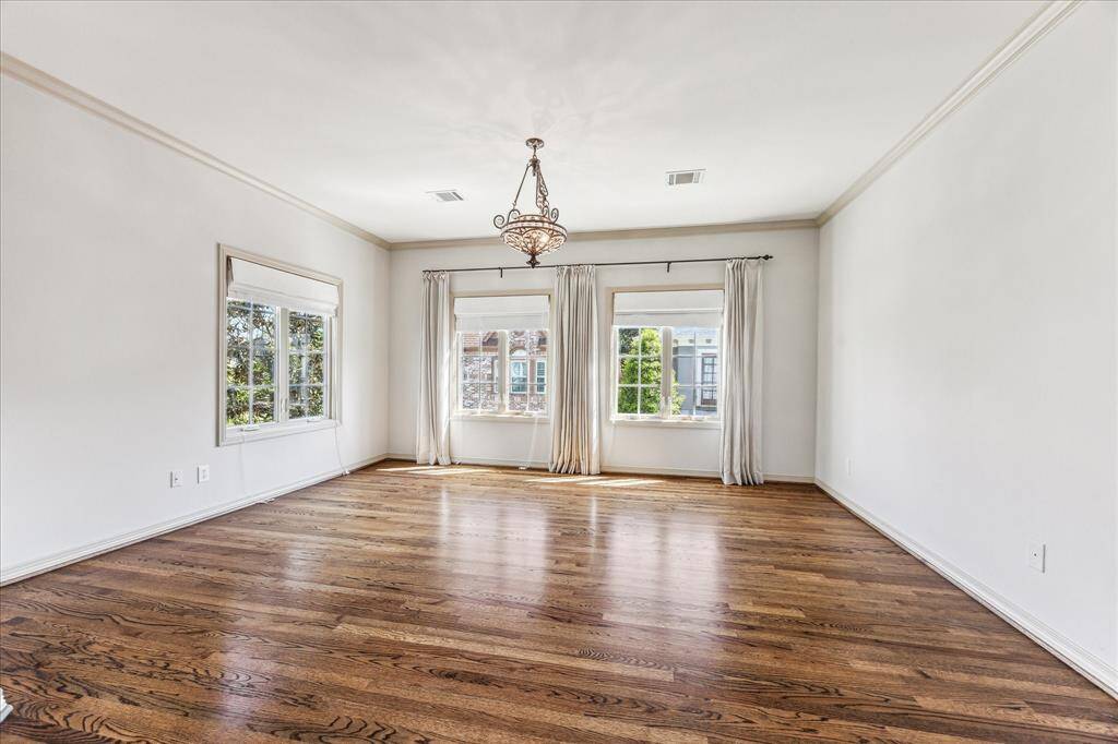 A third bedroom up also features a massive walk in closet and en-suite bath.