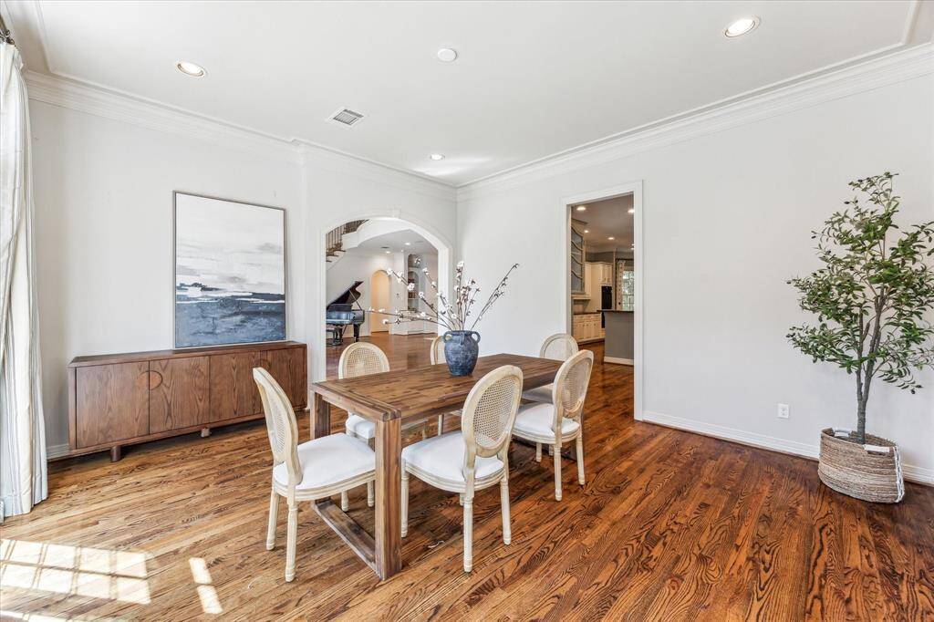 Another view of the openness of the dining room looking into the entry, living room and kitchen.
