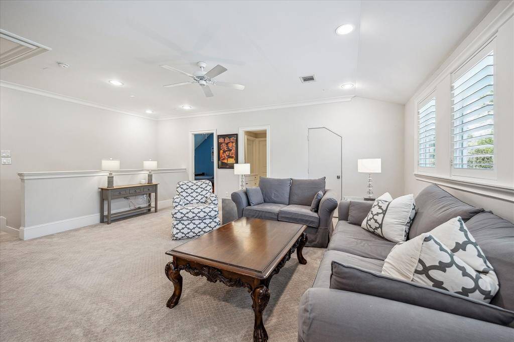 Another view of the game room, with access to a full bathroom shared with the adjacent bedroom.