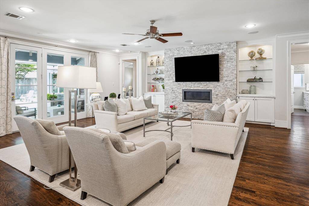 Spacious and bright with an open-concept layout, this home was thoughtfully redesigned in 2014 during a major renovation, including the addition of a second story.