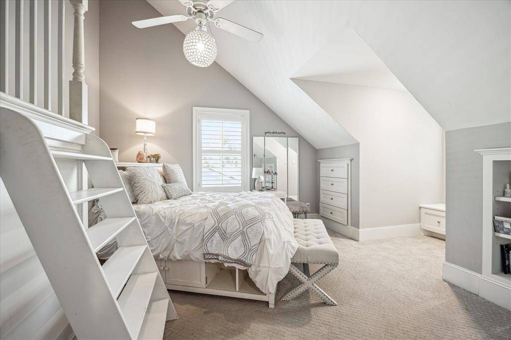 Discover a bedroom with abundant built-in storage, combining style and functionality seamlessly.