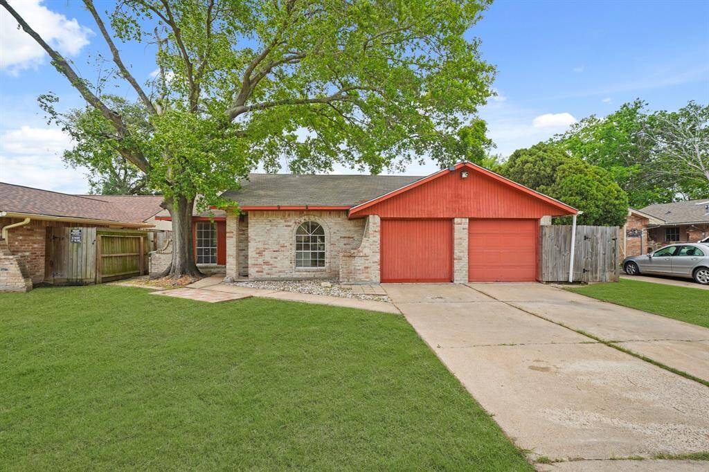 Welcome home to 10115 Copperwood Drive in the charming Woodland Trails North community.