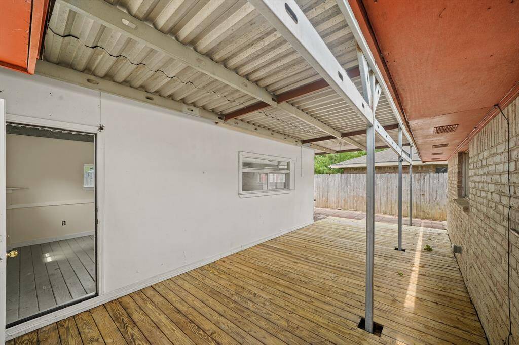 The extended covered deck is perfect for relaxing, dining, or entertaining year-round. Its spacious design offers ample room to enjoy the outdoors in comfort, no matter the season.