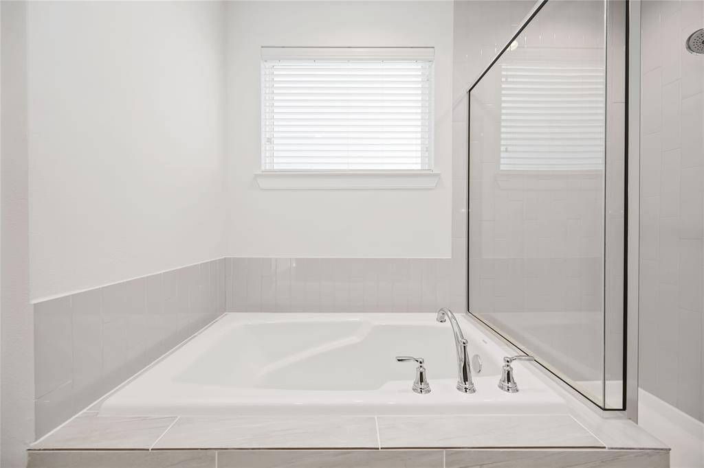 Separate Soaking Tub in Primary Bathroom
