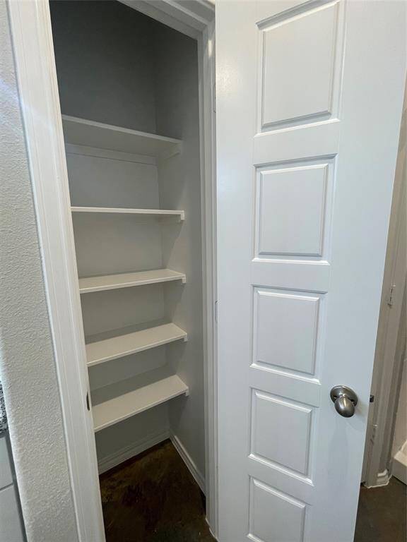 Linen Closet with the Primary Bathroom