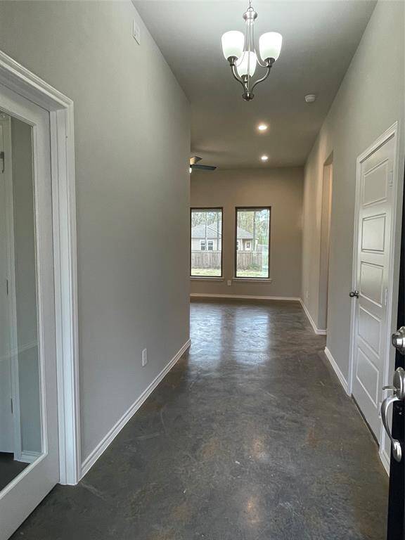 Grand Foyer Entry with a Office Flex Room Entry
