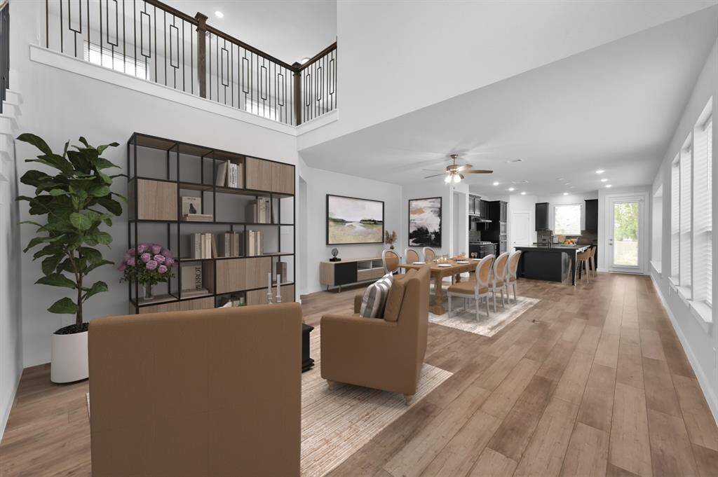 Versatile first floor layout shown with shelving to inspire your inner book lover or to show off your favorite photos or collectibles.