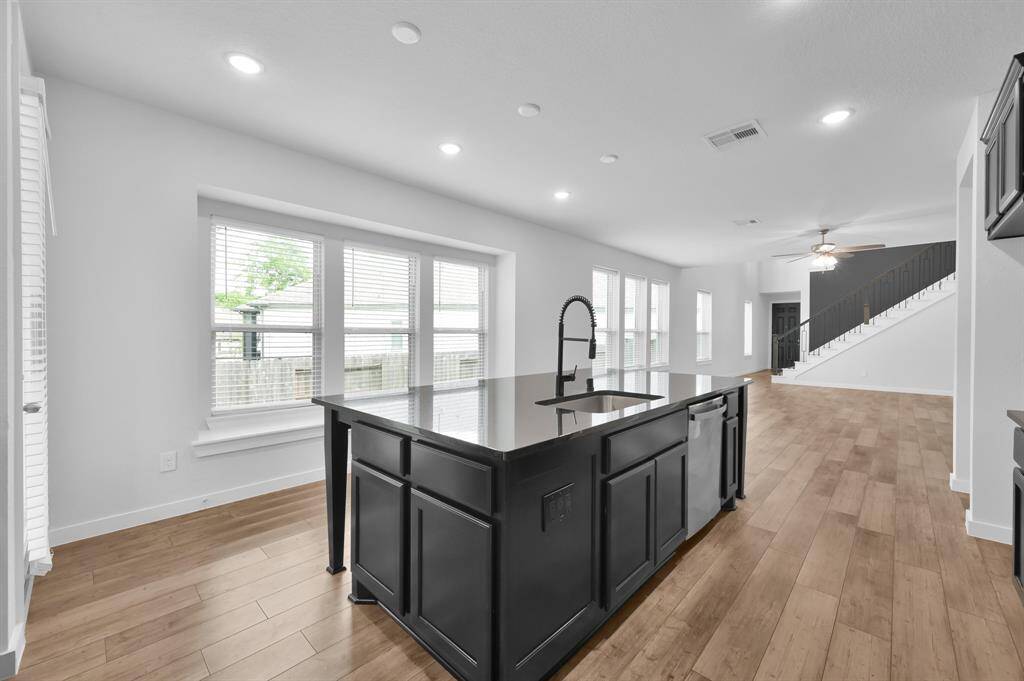 Imagine gathering here with family and friends in the heart of this beautiful home.