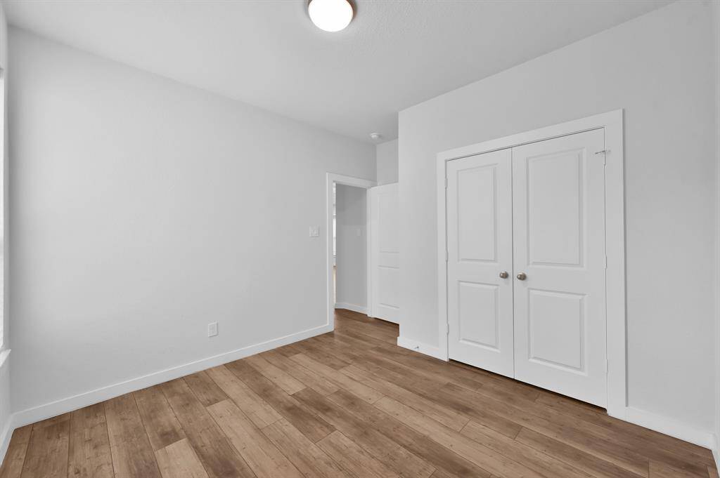 Secondary bedroom/office space on the first floor.