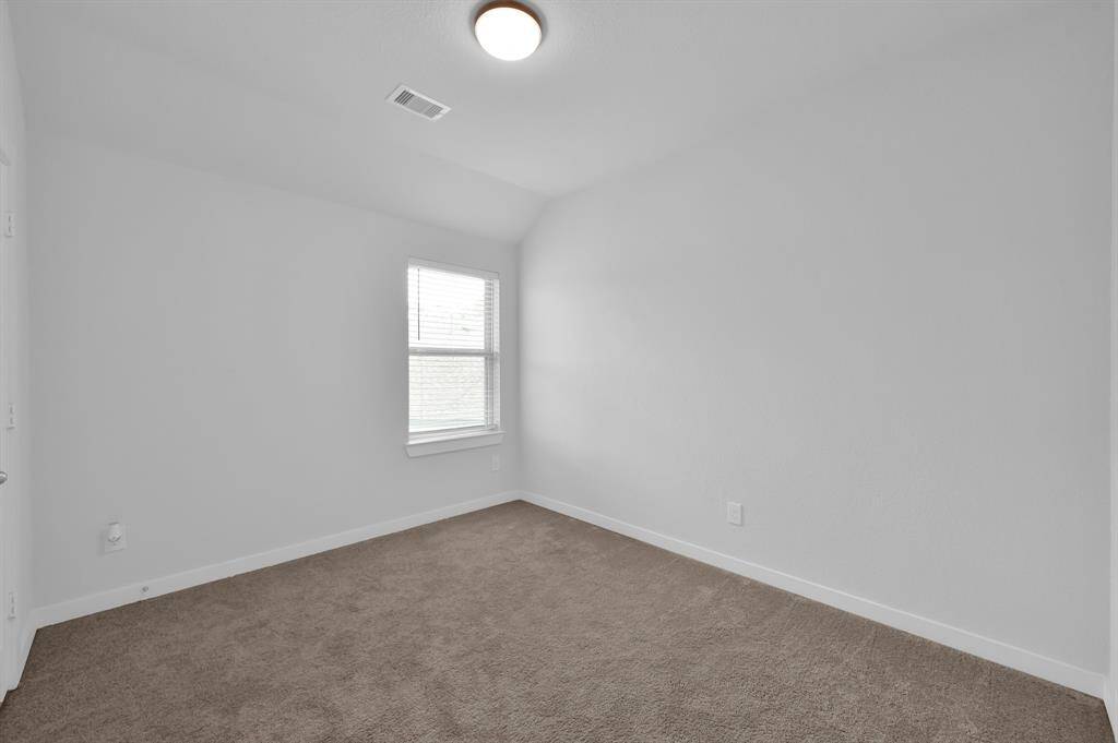 One of two upstairs bedrooms.